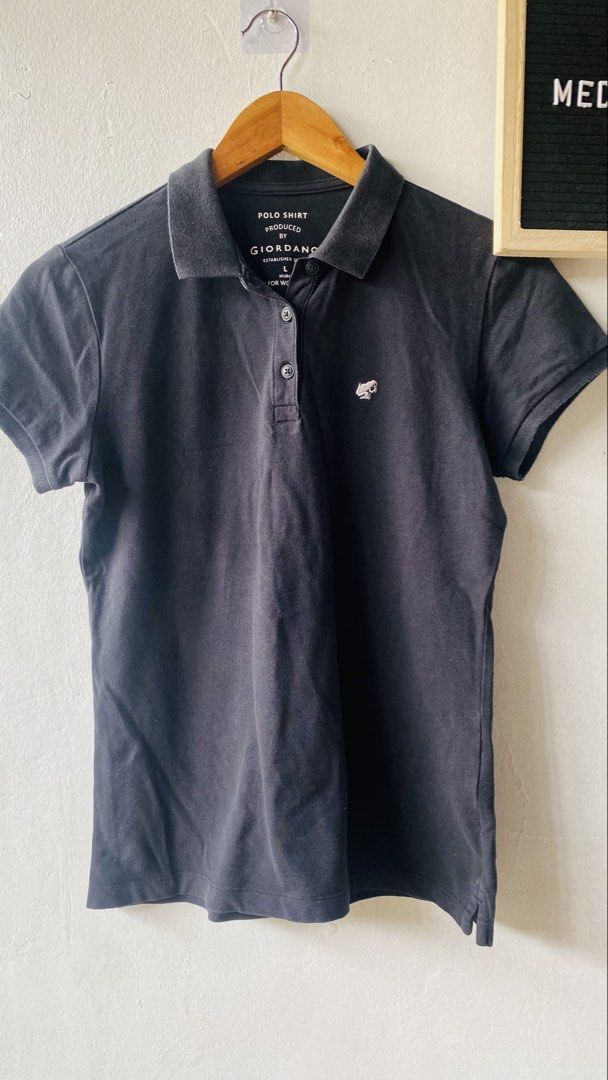 Giordano Black Polo Shirt (Category: Activewear) located in Caloocan City. Submitted by lovemyclothes21 (Listing ID 1469617907, Image 2). Description: - Brand: Giordano - Color: Black - Size: L (comfortably fits standard Medium to Large frames) - Material: Soft and breathable cotton pique fabric - Design: Classic collar, button placket, and small embroidered chest logo - Style: Versatile, perfect for casual daily outfits and smart-casual looks.