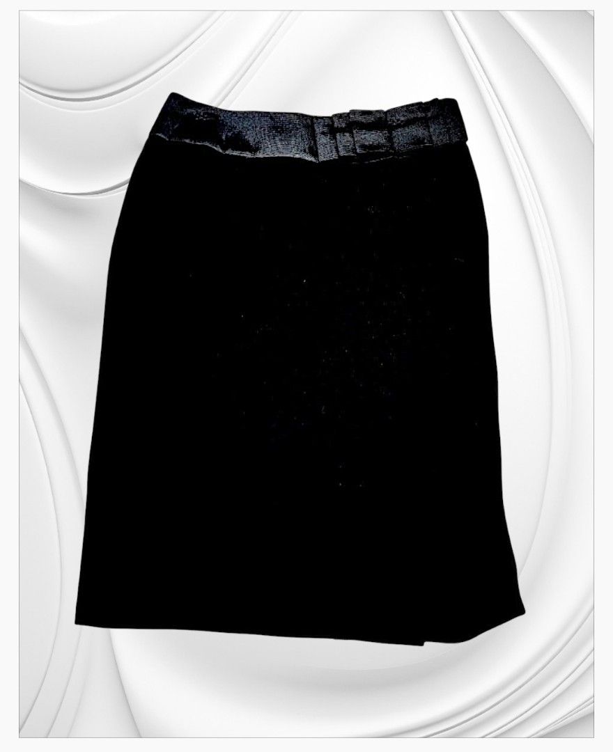 Giorgio Armani Black Skirt (Category: Skirts) located in Paranaque City. Submitted by calm_youngstore7 (Listing ID 1469581325, Image 1). Description: ON SALE! 80% OFF RETAIL! - Brand: Giorgio Armani - Origin: Made in Italy - Condition: Brand new with tags attached - Size: 40 Italian sizing - Measurements: Waist 14.5" across, Total length 25.5" - Design: Elegant pleated waistband with side button and zipper closure - Color: Classic black.
