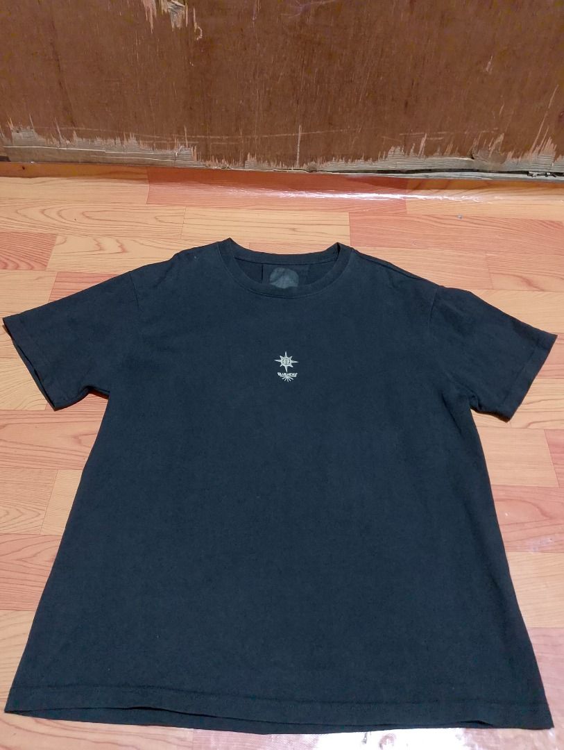 Givenchy Black T-Shirt with Cross Back Print (Category: Tshirts & Polo Shirts ) located in Cavite. Submitted by marvzclothing (Listing ID 1469696480, Image 1). Description: - Brand: Givenchy - Color: Black - Size: Medium on tag ( Fit to large ) - Material: 100% cotton with viscose ribbing (Made in Portugal) - Front Details: Small star and graphic emblem near the neckline - Back Details: Large, detailed cross graphic with a small logo at the botto