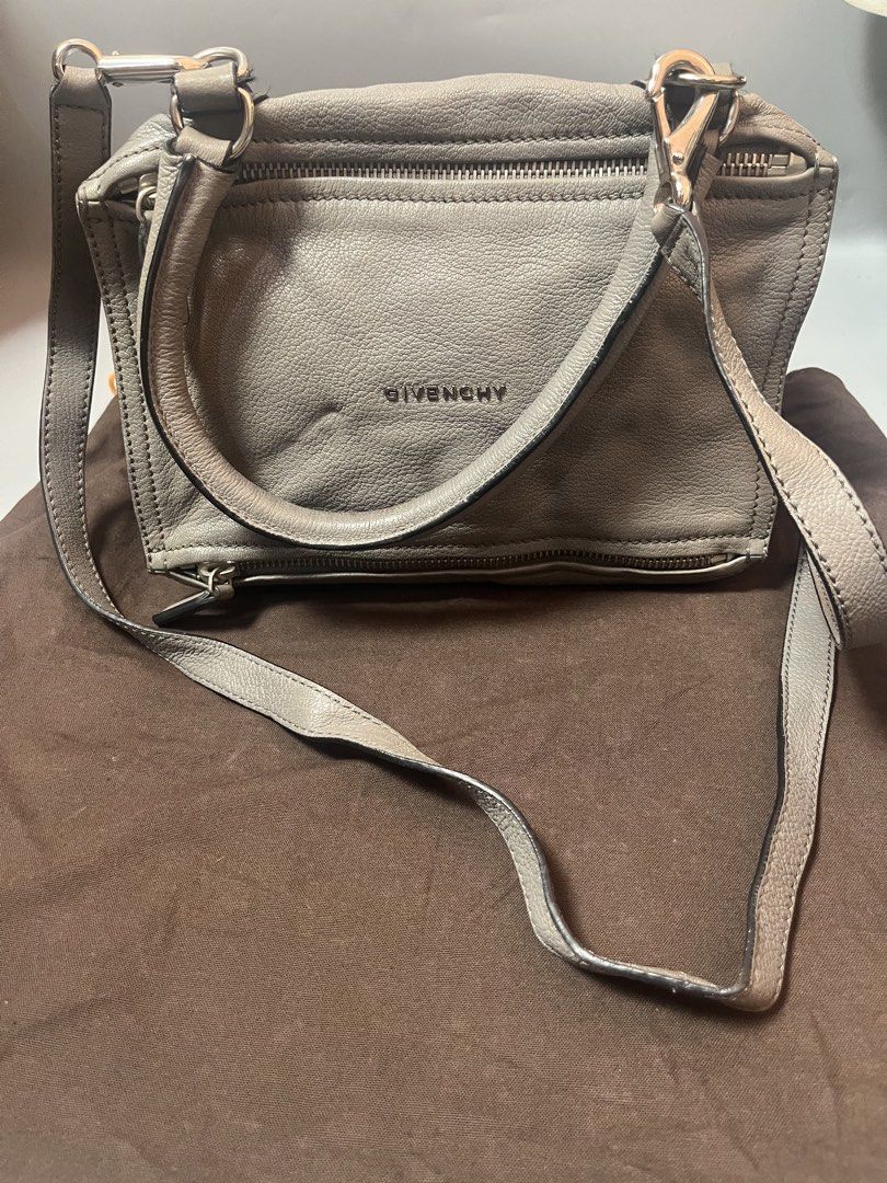 Givenchy Pandora (Category: Luxury Bags & Wallets) located in Quezon City. Submitted by theideal (Listing ID 1469731007, Image 1). Description: Read first before buy Legit/Authentic Givenchy Pandora leather crossbody bag No box Small Still in good and presentable condition No major flaws Minor sign of use only See picture details posted.