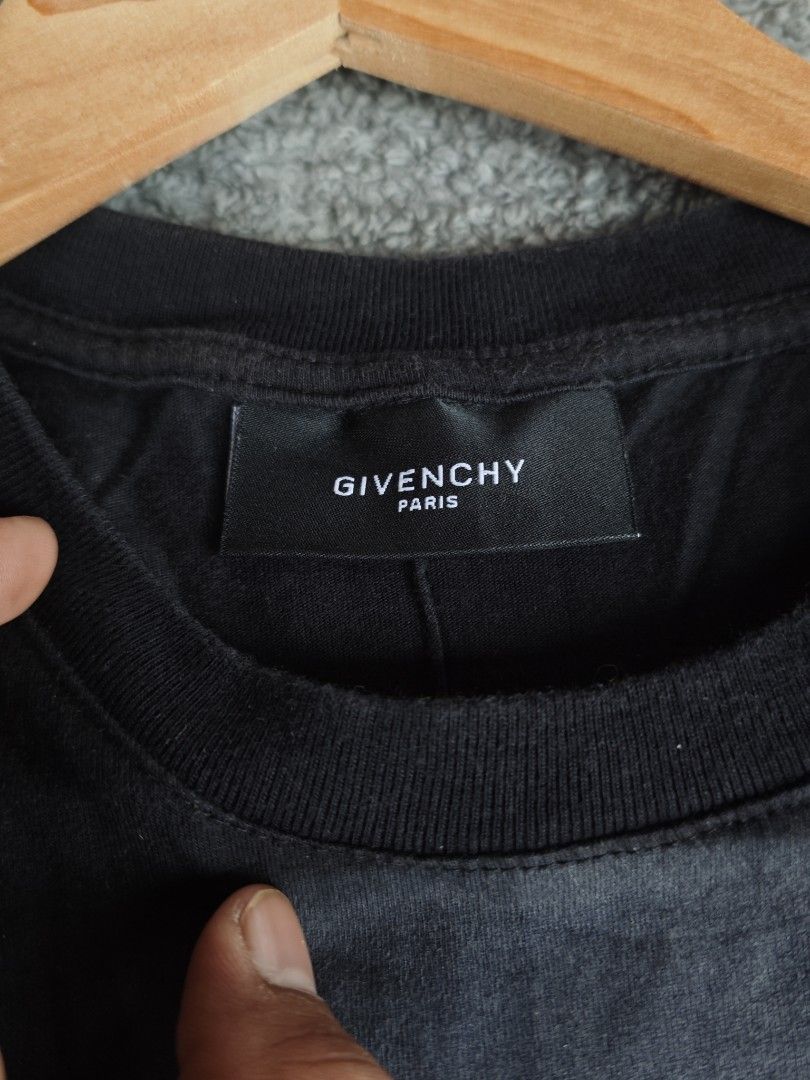 Givenchy Rottweiler Print T-Shirt Black Medium (Category: Shirts) located in Dalaguete. Submitted by three7archives (Listing ID 1469649758, Image 2). Description: - Brand: Givenchy - Item: Rottweiler Graphic Tee - Color: Black - Size: Medium (M) 18/26 - Material: 100% Cotton with polyester second fabric - Origin: Made in Portugal - Design: Iconic aggressive dog print on the front, classic crew neck, short sleeves - Condition: Interior tags and br