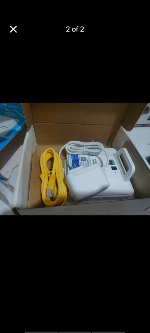 Globe At Home Prepaid Wifi Router (Category: Networking) located in Manila. Submitted by billythekid05 (Listing ID 1469721726, Image 2). Description: - Globe At Home prepaid WiFi box and router - Brand new and 100% unopened set - Complete inclusions: Power adapter, yellow ethernet cable, and manual - Untouched accessories - Quick and convenient internet setup for home use.