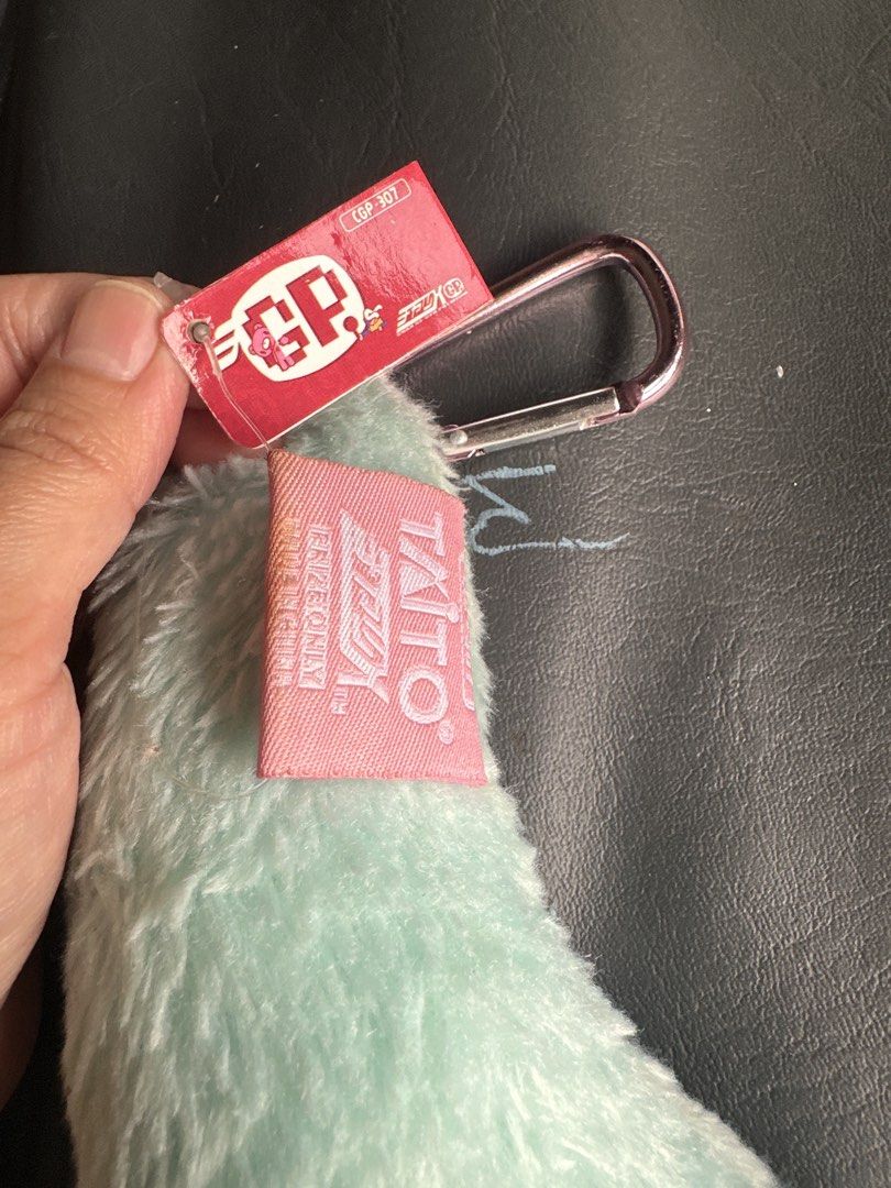 Gloomy Arm keychain (Category: Plushies & Soft Toys) located in Cainta. Submitted by shopbyyna (Listing ID 1469637444, Image 2). Description: - Authentic Taito prize item (Tagged CGP-307) - Super soft mint green fuzzy plush body - Cute dangling feet in pinkish-purple and yellow details - Equipped with a stylish metallic pink carabiner clip - Brand new with original red paper tag attached.