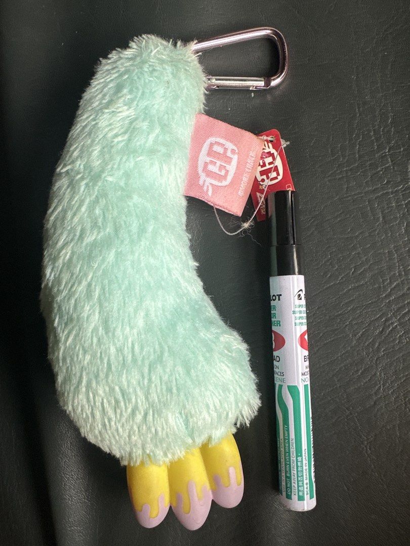 Gloomy Arm keychain (Category: Plushies & Soft Toys) located in Cainta. Submitted by shopbyyna (Listing ID 1469637444, Image 1). Description: - Authentic Taito prize item (Tagged CGP-307) - Super soft mint green fuzzy plush body - Cute dangling feet in pinkish-purple and yellow details - Equipped with a stylish metallic pink carabiner clip - Brand new with original red paper tag attached.