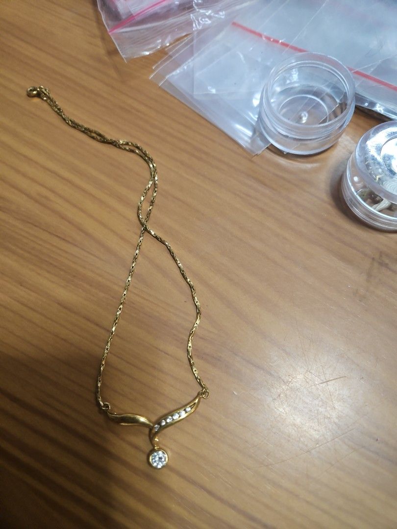 Gold Necklace with Rhinestone Pendant (Category: Necklaces) located in Manila. Submitted by hausofgadgetatbp (Listing ID 1469736929, Image 1). Description: - Elegant yellow gold finish necklace - Features a decorative rhinestone-accented pendant - Fine link chain with a secure clasp - Versatile piece for daily wear or special occasions - Well-maintained and carefully stored.
