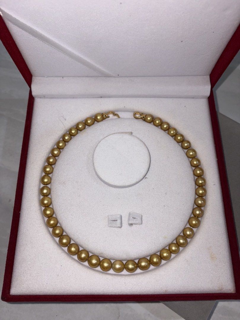 Golden Southsea Pearl (Category: Body Jewelry) located in Manila. Submitted by ivan_guarin.26 (Listing ID 1469606271, Image 2). Description: Golden Southsea Pearl Size : 8mm/9mm With minimal fish bite With Jewelry box You can send messages for other pictures .