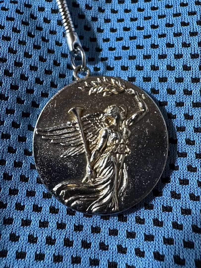 Gold-Tone Winged Victory Keychain | Engravable Success & Milestone Gift (Category: Charms) located in Bacarra. Submitted by retrovival (Listing ID 1469578367, Image 2). Description: 🏆 Carry a reminder of your victory. Featuring a figure of Nike, the Greek goddess of victory, known as Victoria in Roman mythology, this keychain is a meaningful keepsake for achievements worth remembering. Its gold tone symbolizes success, excellence, and triumph, r