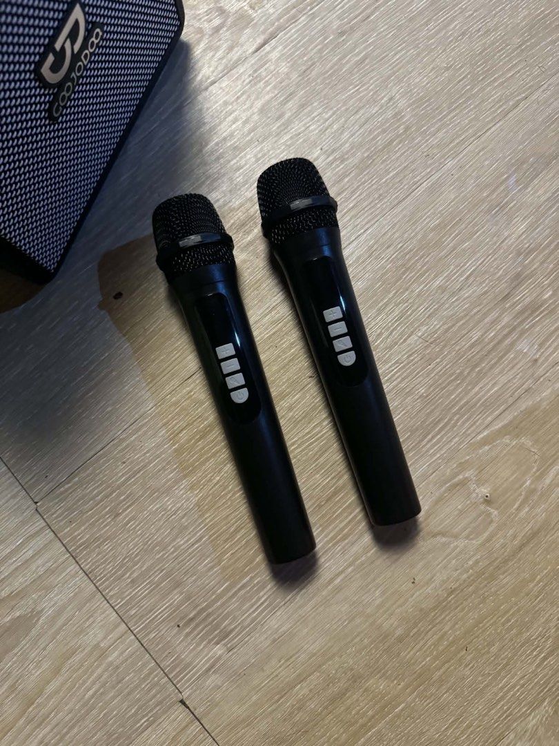 GOOJODOQ AB4098 Bluetooth Speaker with Two Microphones (Category: Soundbars, Speakers & Amplifiers) located in Cavite. Submitted by jwai27 (Listing ID 1469687534, Image 3). Description: - Model: GOOJODOQ AB4098 Bluetooth Speaker - Color: Sleek black with premium physical gold dials - Audio Control: Independent dials for volume, bass, and treble adjustments - Inclusion: 2 wireless microphones for ultimate karaoke sessions - Accessories: Charging c