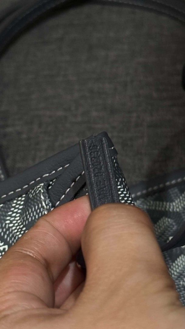 Goyard Anjou Tote Bag Grey (Category: Luxury Bags & Wallets) located in Cavite. Submitted by loriojenni09117 (Listing ID 1469702475, Image 2). Description: - Color: Classic Grey - Design: Signature Goyard chevron print canvas - Includes: Matching mini pouch - Details: Dual leather handles with contrast stitching and stamped Goyard Paris interior branding - Style: Structured, roomy, and versatile for everyday wear.