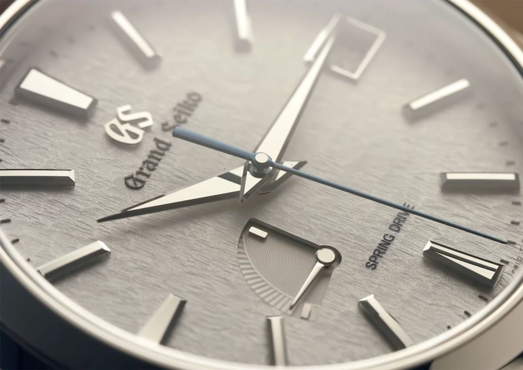 Grand Seiko Spring Drive Snowflake Dial Titanium Watch (Category: Luxury Watches) located in Manila. Submitted by fletchd (Listing ID 1469736215, Image 3). Description: - Model: Grand Seiko Spring Drive Snowflake - Material: Lightweight titanium case and bracelet - Dial: Iconic textured white 'Snowflake' dial with date window at 3 o'clock - Complications: Blued steel sweep seconds hand and power reserve indicator - Movement: Exhibition caseback d