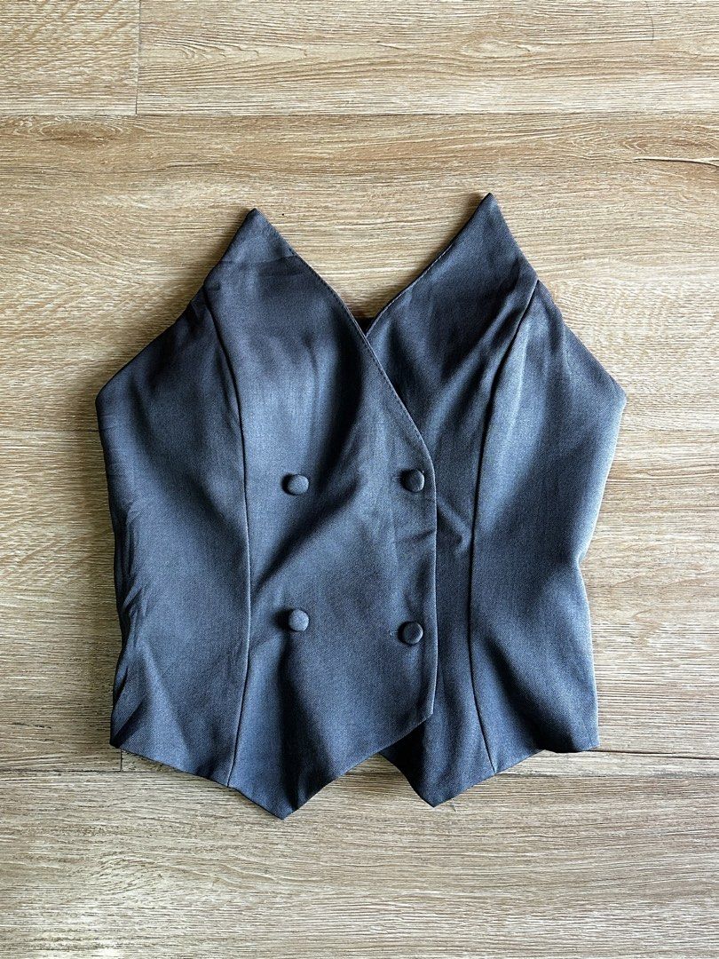 Gray Vest Tube Corset Top (Category: Sleeveless) located in Taguig. Submitted by my.serendipithrift (Listing ID 1469639762, Image 1). Description: Size: XS-M Makapal tela Padded Smocked back Design buttons Vv pretty, perfect for casual or formal events.
