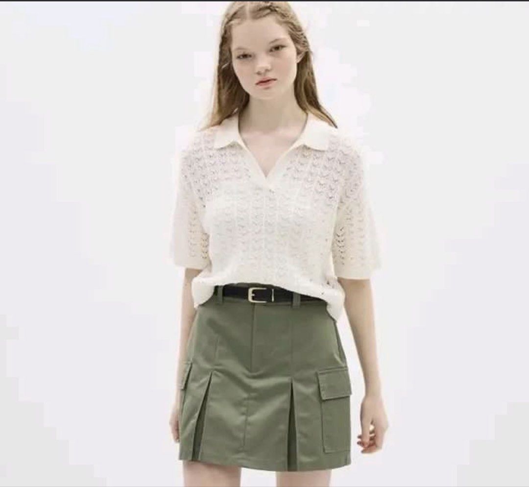 Green Cargo Mini Skirt with Pleats (Category: Skirts) located in Taguig. Submitted by jbep_ (Listing ID 1469606184, Image 2). Description: - Style: Streetwear cargo mini skirt - Color: Olive green - Features: Front pleats, side cargo pockets, belt loops, button closure - Material: Durable twill fabric - Condition: Brand new / Great for casual outfits - Size is Large, size chart photo attached RFS: Bought in HK but I gained weight when I got back 