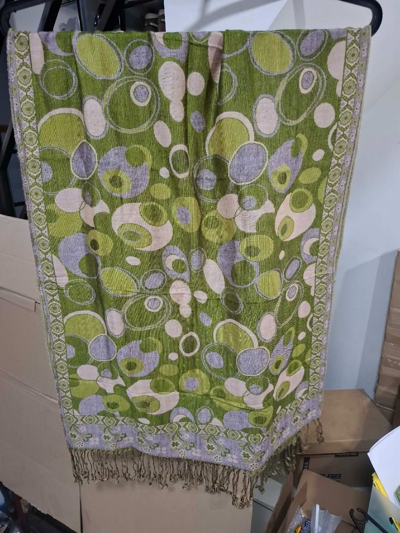 Green Circle Print Shawl (Category: Scarves) located in Pasig City. Submitted by dripcounty (Listing ID 1469688026, Image 1). Description: Green Circle Print Shawl ₱150 Bought in the Philippines Size: Free size Condition: Good / preloved Green, cream and lavender circle-patterned shawl with fringed ends. Actual item shown in photos. Delivery fee shouldered by buyer (Lalamove / other courier). Item price excludes delivery. Payment via cash / GCash