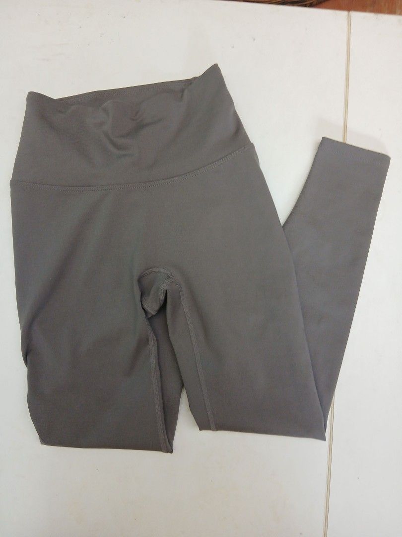 Grey high-waisted athletic leggings workout pants (Category: Activewear) located in Cainta. Submitted by chickennuggirl (Listing ID 1469580061, Image 1). Description: - Color: Grey (neutral solid shade) - Rise: High-waisted with clean seams - Fabric: Stretchy, clean condition - Versatility: Perfect for workouts or daily lounging - Easy to pair with any top.