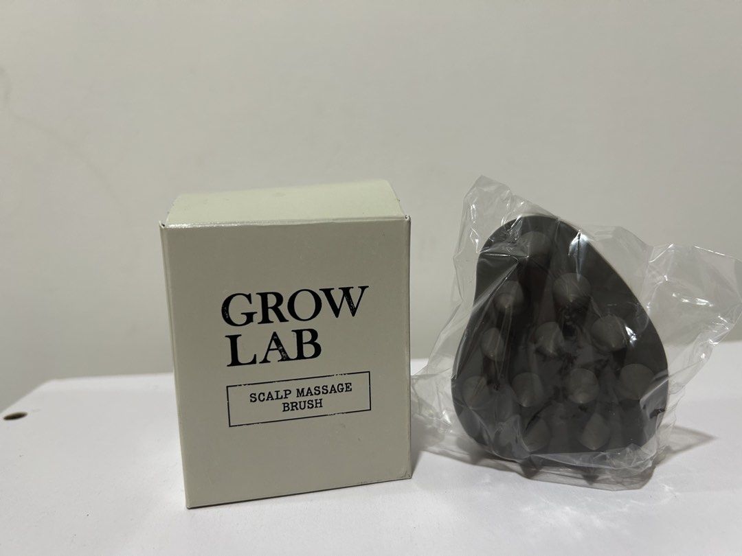 GROW LAB Scalp Massage Brush (Category: Hair) located in Rizal. Submitted by CMaeCAme (Listing ID 1469647489, Image 1). Description: a silicone scalp care and shampoo brush designed to stimulate the scalp.
