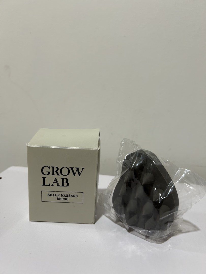 GROW LAB Scalp Massage Brush (Category: Hair) located in Rizal. Submitted by CMaeCAme (Listing ID 1469647489, Image 2). Description: a silicone scalp care and shampoo brush designed to stimulate the scalp.