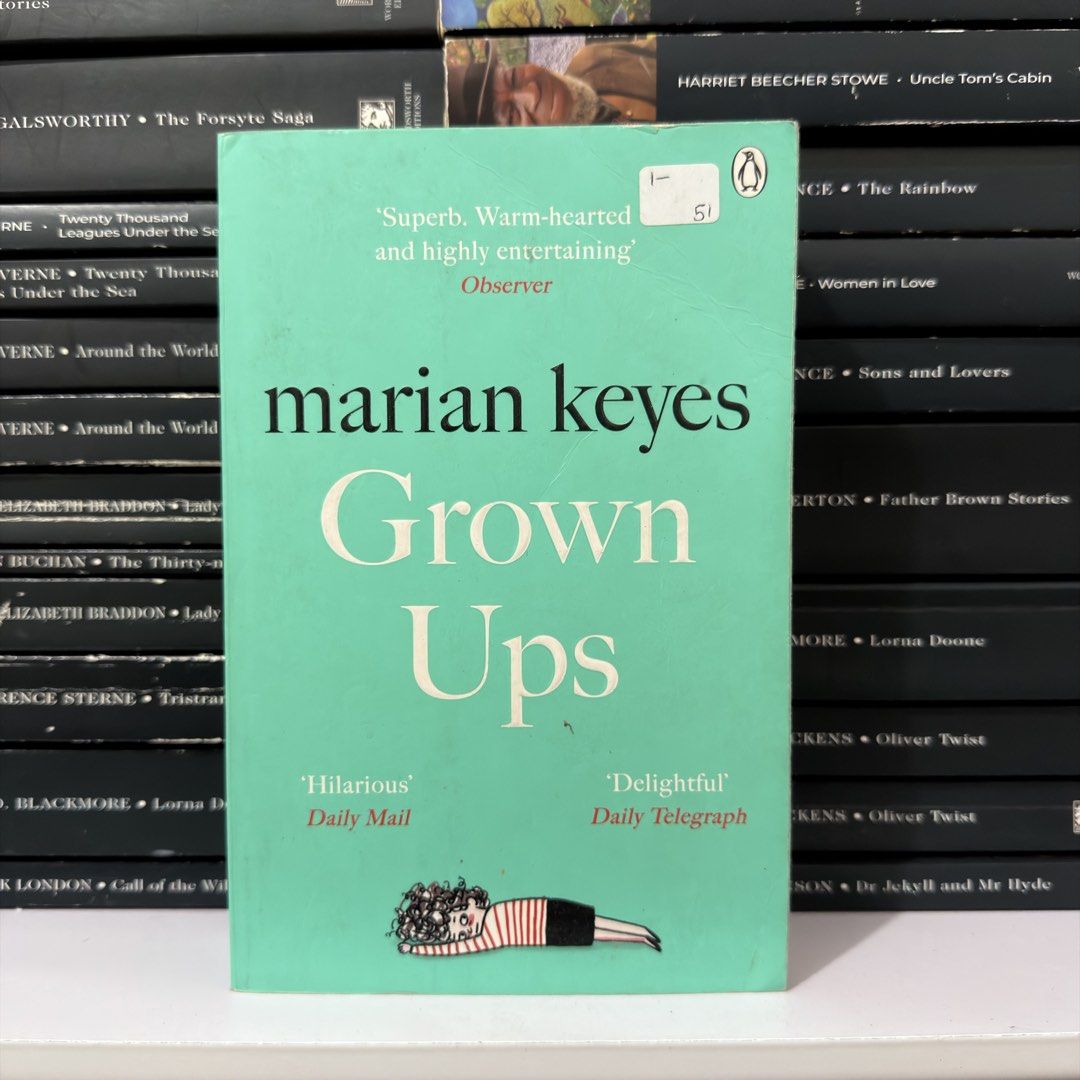 Grown Ups by Marian Keyes Paperback Novel (Category: Storybooks) located in Lingayen. Submitted by readwjane (Listing ID 1469591737, Image 1). Description: - Title: Grown Ups by Marian Keyes - Edition: Penguin paperback with bright green cover - Condition: Read once, minimal shelf wear, sturdy spine, and clean pages - Genre: Contemporary fiction.