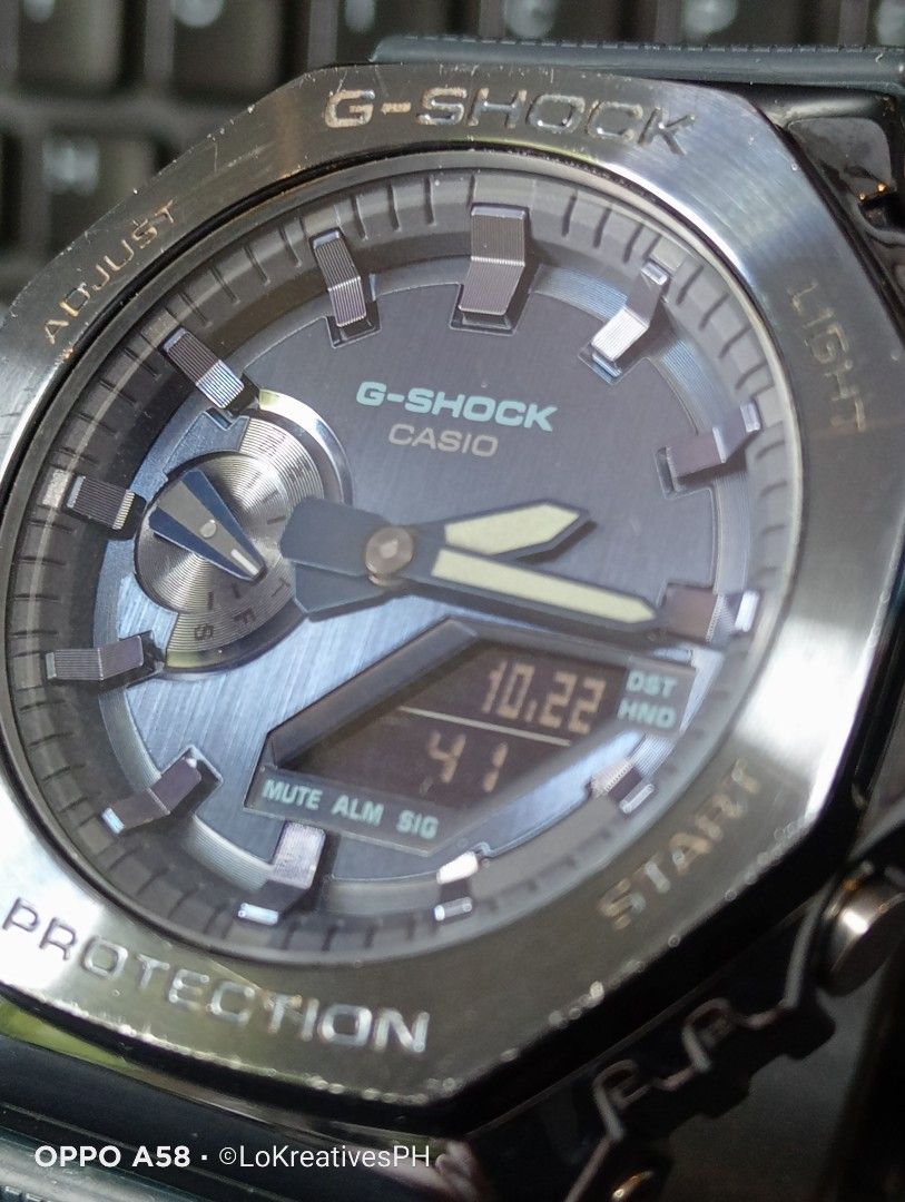 G-Shock GM-2100N-2A (Category: Men's Watches) located in Cavite. Submitted by purpose_served (Listing ID 1469730608, Image 3). Description: GM-2100N-2A G-STEEL GM-2100 Series An analog-digital timepiece from the metal-clad 2100 series featuring an octagonal stainless steel bezel with a dark blue ion-plated finish and a textured blue dial. Basic Information Price: MSRP ₱17,000 +++ Case size: 49.3 × 44.4 × 11.8 mm Weight: 72 g Case: Stainless steel