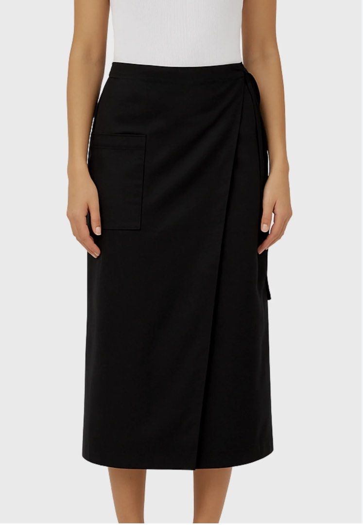 GU Black Midi Wrap Skirt Size L (Category: Skirts) located in Cavite. Submitted by yakultjeni85475 (Listing ID 1469747068, Image 1). Description: - Brand/Model: GU - Size: L - Color: Solid Black - Style: Wrap-style front midi skirt - Features: Handy side pocket and comfortable elastic waistband at the back - Condition: Great for everyday wear, easy to match with tees and blouses.