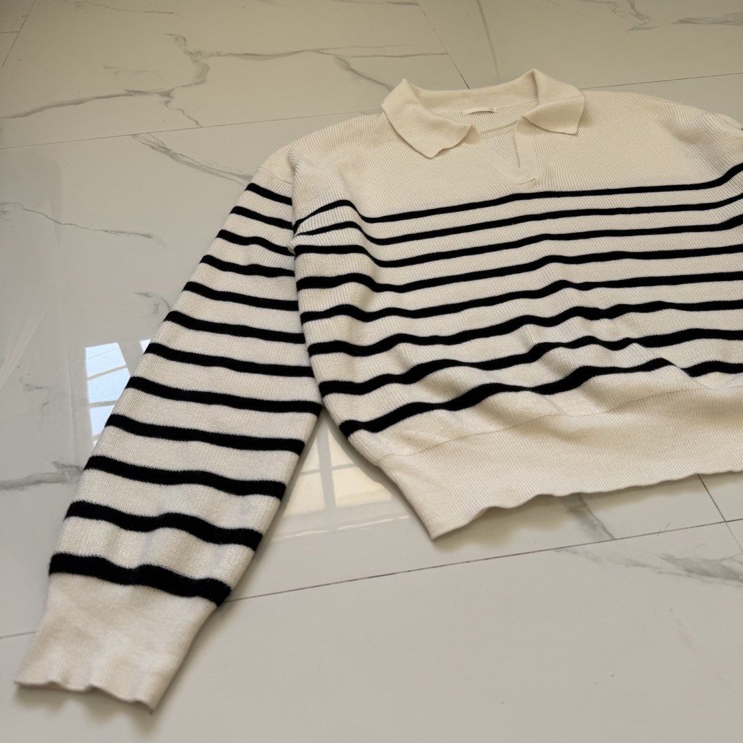 GU Border Polo Sweater (Category: Coats, Jackets and Outerwear) located in Santo Tomas. Submitted by the580closet (Listing ID 1469697555, Image 3). Description: - Size: XL 21 inches - chest 21 inches - length 21 inches - shoulder 20.5 inches - sleeves.