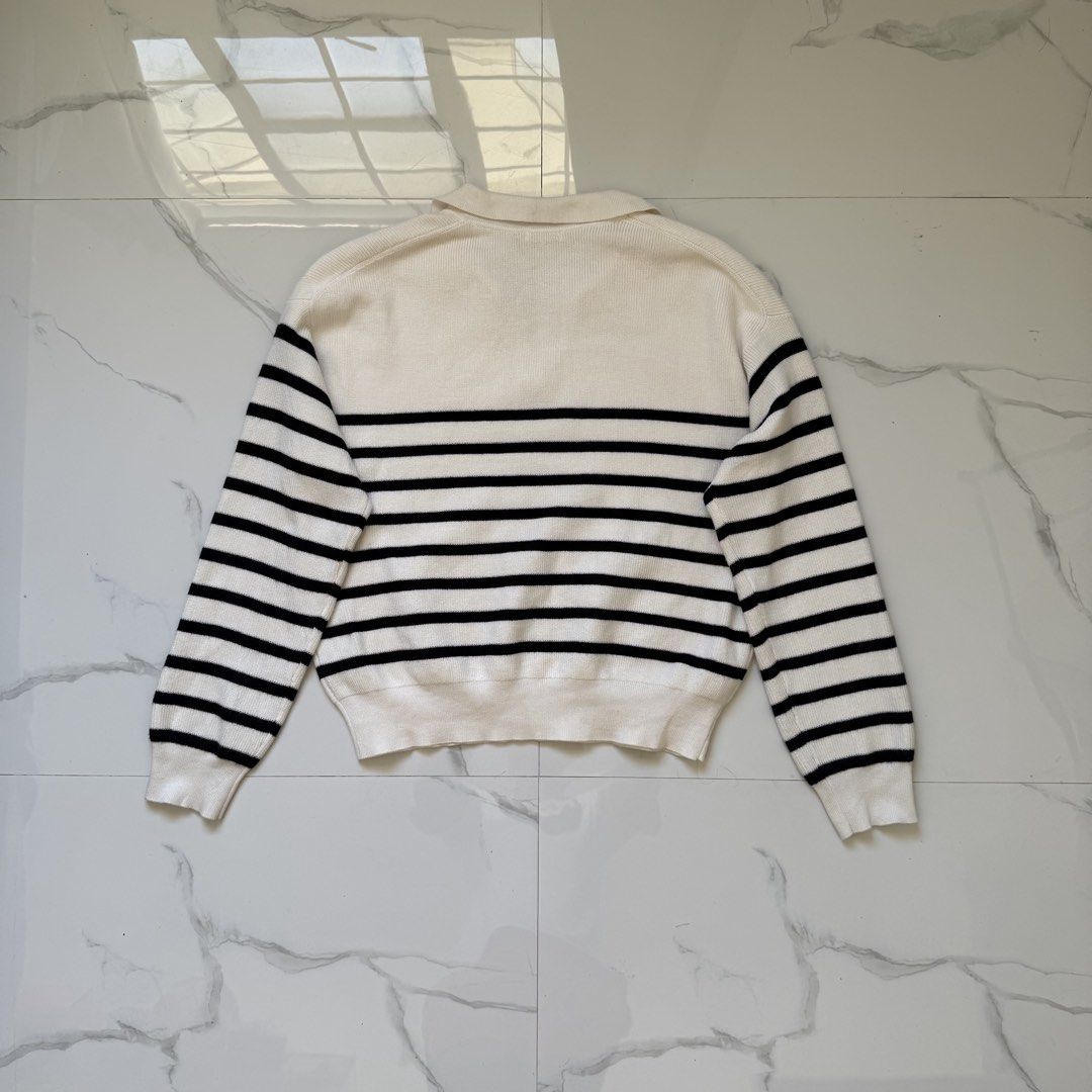 GU Border Polo Sweater (Category: Coats, Jackets and Outerwear) located in Santo Tomas. Submitted by the580closet (Listing ID 1469697555, Image 2). Description: - Size: XL 21 inches - chest 21 inches - length 21 inches - shoulder 20.5 inches - sleeves.
