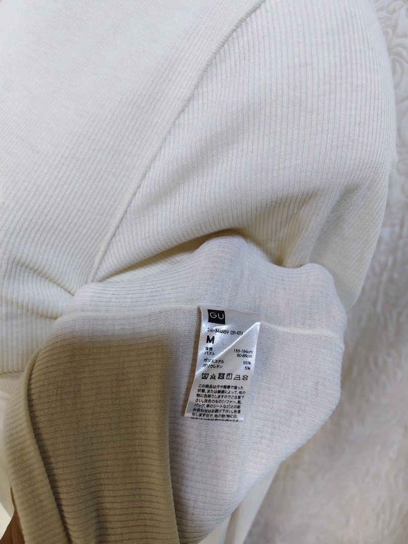 GU Cream Ribbed Lettuce-Edge Turtleneck Top (Medium) (Category: Coats, Jackets and Outerwear) located in Baguio. Submitted by pisces_beattidue23 (Listing ID 1469755420, Image 3). Description: GU Cream Ribbed Lettuce-Edge Turtleneck Top (Medium).