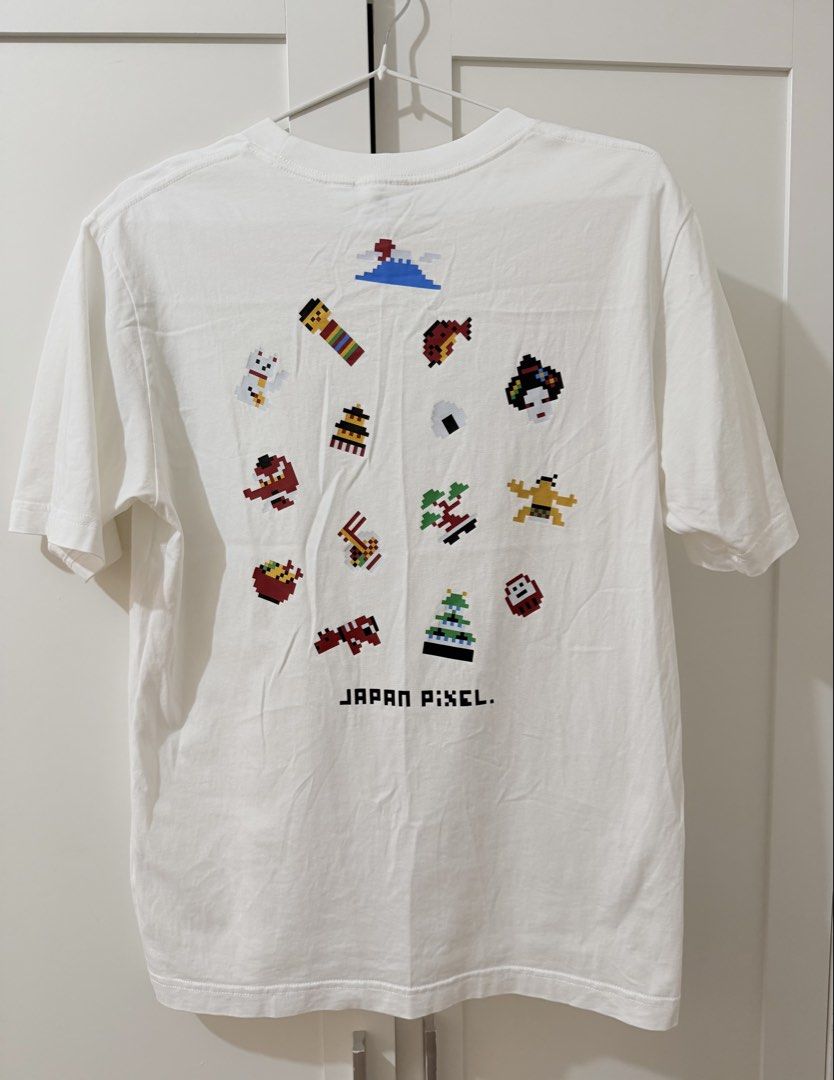 GU Japan Pixel Graphic Shirt (Category: Shirts) located in Taytay. Submitted by chie2022 (Listing ID 1469667211, Image 2). Description: Original Bought from GU store, Japan Good as new Worn 2-3 times only Size: Small Color: White Width: 20 inches Length: 27 inches Rfs: Decluttering .