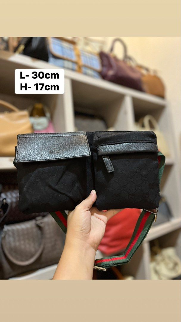 Gucci Black GG Canvas Web Strap Belt Bag (Category: Luxury Bags & Wallets) located in Bacolod City. Submitted by vintage_vogue6100 (Listing ID 1469670875, Image 1). Description: - Brand: Gucci - Material: Black canvas with iconic GG monogram and black leather trim - Design: Front flap pockets and secure back zip compartment - Strap: Signature green and red web stripe adjustable strap with silver-tone hardware - Interiore: Black fabric lining - Di