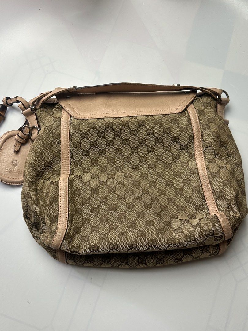 Gucci canvas (Category: Luxury Bags & Wallets) located in Orani. Submitted by ajgav69 (Listing ID 1469583768, Image 2). Description: Gucci canvas big size No hidden issue No rubs No rubs Gucci underzip.