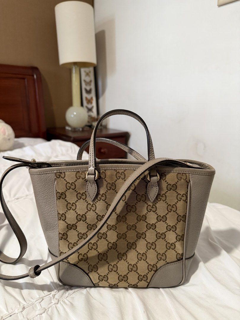 Gucci GG Canvas Bree Crossbody (Category: Luxury Bags & Wallets) located in Cavite. Submitted by gentlyused_ (Listing ID 1469675269, Image 2). Description: - Brand: Gucci Tote Bag - Material: Classic beige GG canvas with grey leather trim - Straps: Top handles and adjustable shoulder strap - Condition: Great everyday size, clean interior, structured shape, with minor scuffing on one bottom corner as pictured.