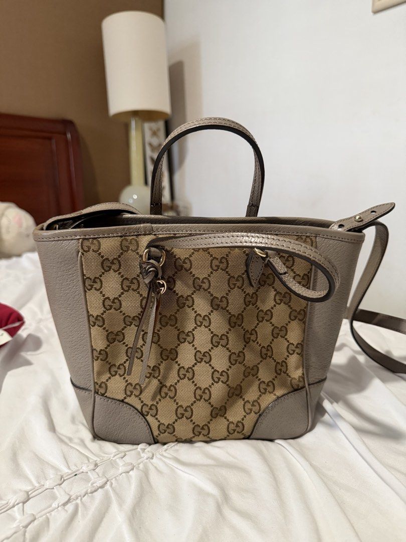 Gucci GG Canvas Bree Crossbody (Category: Luxury Bags & Wallets) located in Cavite. Submitted by gentlyused_ (Listing ID 1469675269, Image 1). Description: - Brand: Gucci Tote Bag - Material: Classic beige GG canvas with grey leather trim - Straps: Top handles and adjustable shoulder strap - Condition: Great everyday size, clean interior, structured shape, with minor scuffing on one bottom corner as pictured.