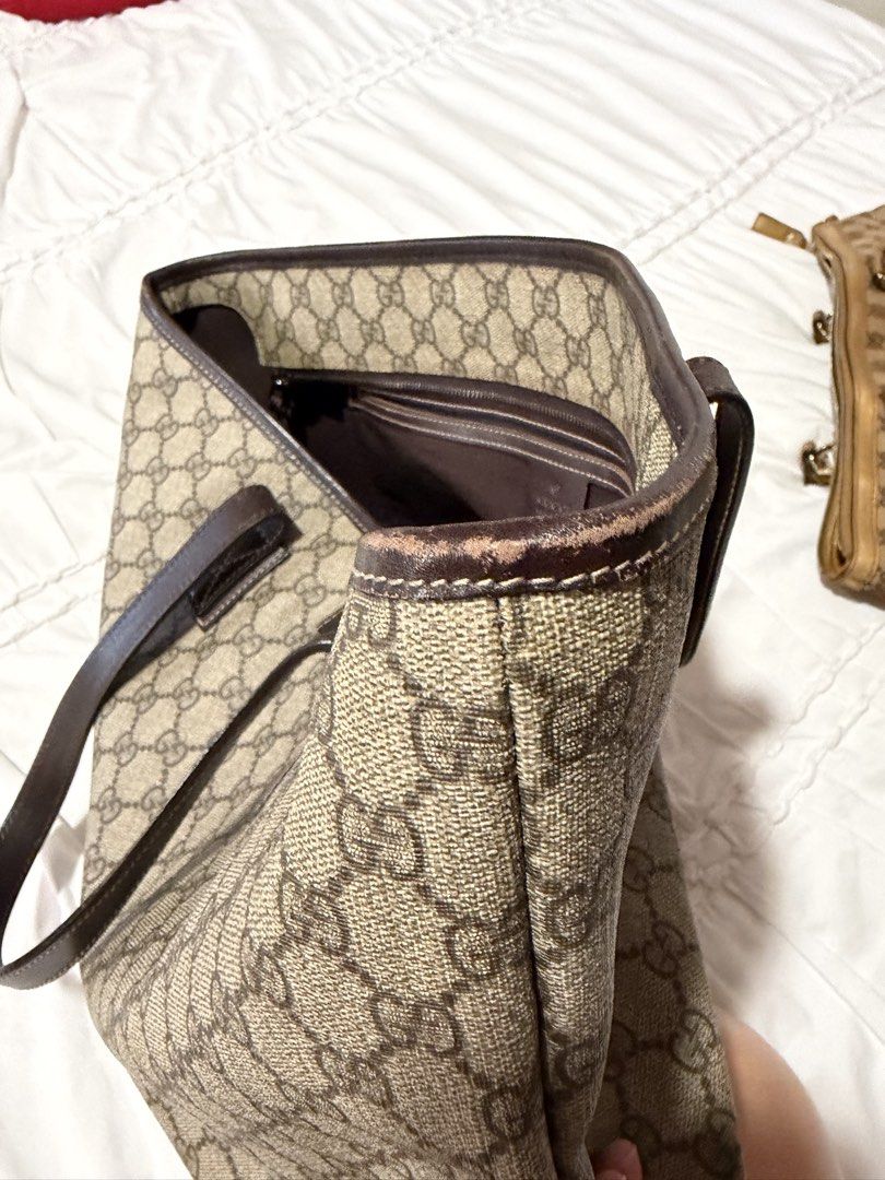 Gucci GG Supreme Joy (Category: Luxury Bags & Wallets) located in Cavite. Submitted by gentlyused_ (Listing ID 1469674894, Image 2). Description: - Authentic Gucci tote in iconic GG monogram canvas - Classic brown leather trim and comfortable double shoulder straps - Secure zip-top closure with a spacious interior and zipped pocket - Perfect everyday shoulder bag with plenty of room for essentials - Condition note: Noticeable wear along the top e