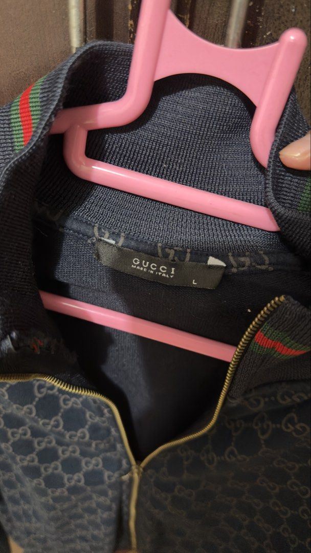 Gucci Monogram Zip-Up Track Jacket Size L (Category: Coats, Jackets and Outerwear) located in Manila. Submitted by itsmepey (Listing ID 1469730166, Image 3). Description: - Dark Navy with all-over GG monogram pattern - great condition with only broken zipper slider broken rfs: not using .