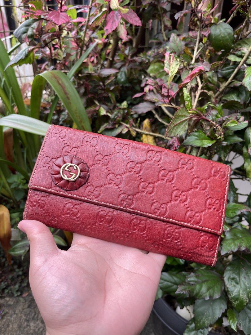 GUCCISSIMA CONTINENTAL RED LONG WALLET (Category: Luxury Bags & Wallets) located in Baguio. Submitted by closetgc.clothingshop (Listing ID 1469618154, Image 1). Description: Gucci guccissima red long wallet Very good condition ( Guaranteed Authentic ) .