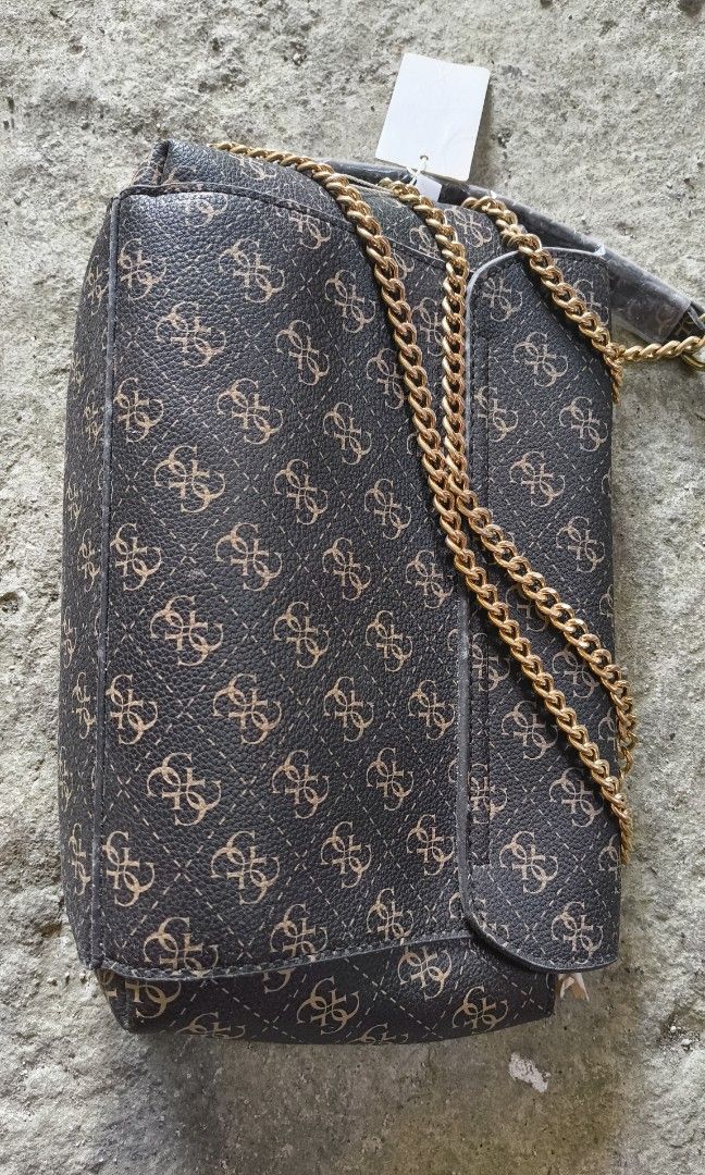 guess chain sling crossbody bag (Category: Cross-body Bags) located in Cavite. Submitted by swiftfish_2c26c0 (Listing ID 1469614608, Image 3). Description: .