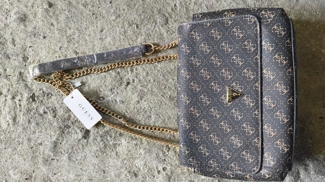 guess chain sling crossbody bag (Category: Cross-body Bags) located in Cavite. Submitted by swiftfish_2c26c0 (Listing ID 1469614608, Image 1). Description: .