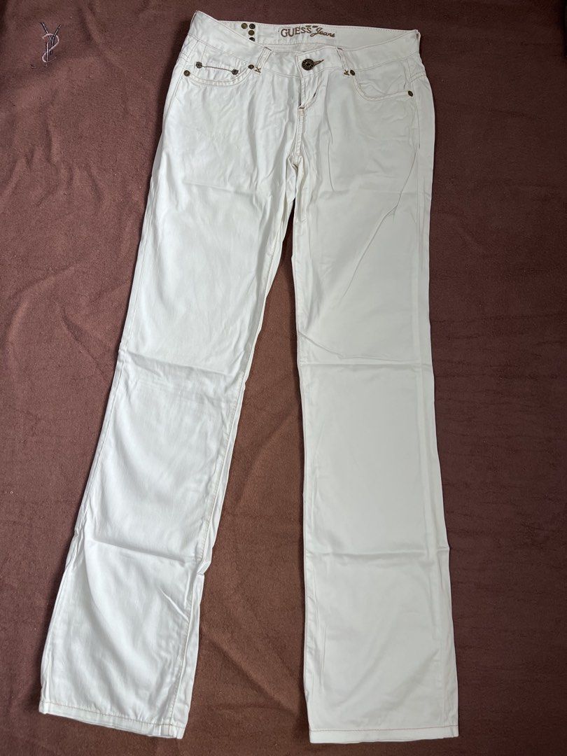 Guess Jeans White Denim Pants (Category: Jeans) located in Mandaluyong City. Submitted by chienneclassique (Listing ID 1469689741, Image 1). Description: - Brand: Guess - Style: Straight leg denim pants - Color: White - Hardware: Bronze with studs on back pockets - Details: Branded waistband patch on the back and classic contrast stitching - Condition: Excellent - Mode of Payment: GCash, BPI, or BDO - Shipping: Via J&T Express or Lalamove (Buyer 