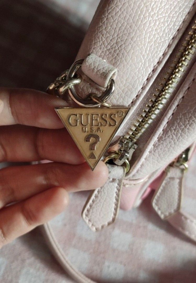 Guess sling bag (Category: Cross-body Bags) located in Cavite. Submitted by rydes_clo (Listing ID 1469619499, Image 2). Description: -Legit, money back guaranteed if proven fake -very cute as in ang cute nya sa personal -uncommon/rare design so wala lang masyadong katulad -ang ganda ng color nya - instagraaaaaaaamable -MOP: gcash.