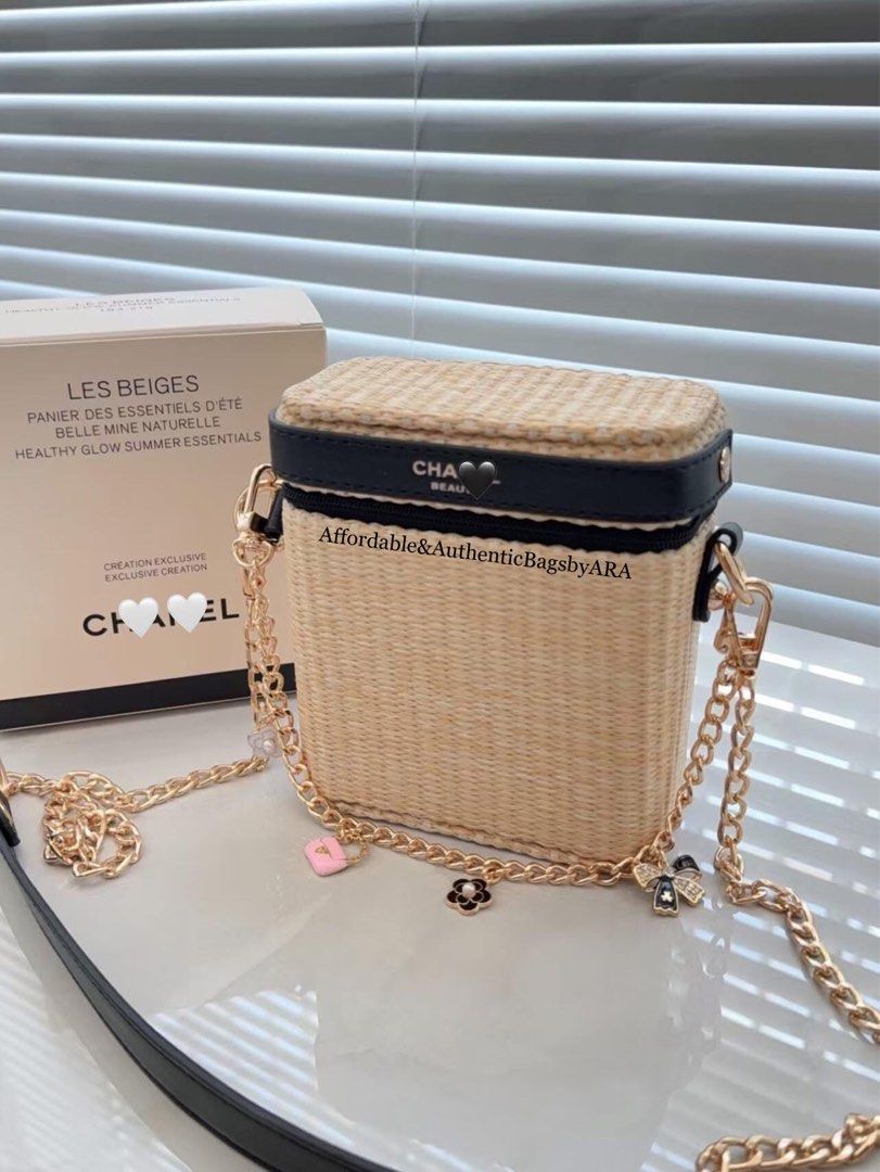 GWP CHANEL LES BEIGES STRAW VANITY BAG (Category: Cross-body Bags) located in Daet. Submitted by ecassenluxuries (Listing ID 1469617535, Image 2). Description: 📌 FIXED PRICE ALREADY ▫️Brand: Chanel Les Beiges Summer Essentials Vanity Bag ▫️Material/Design: Straw texture body with classy black trim ▫️Modified Strap: Gold chain with leather weave and convenient metal ball adjuster ▫️ Inclusions: Comes with original box ( Charms not included ) ▫️Ca