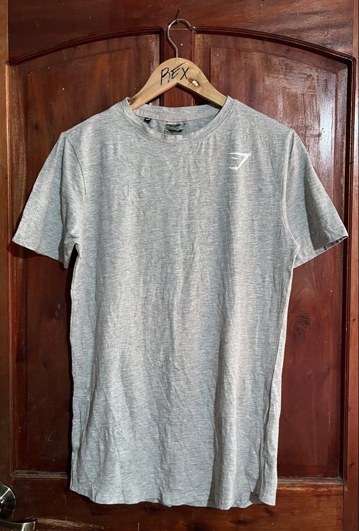 Gymshark Crest (Category: Tshirts & Polo Shirts ) located in Naga. Submitted by rexivan (Listing ID 1469581943, Image 1). Description: Gymshark Crest 👉🏽Like new Condition 👉🏽dimension: 18 Width 27 Length 👉🏽Issue: No Issue 👉🏽Color rate: 10/10 👉🏽Color: Light Grey 👉🏽Size: Small on tag 👉🏽Need Wash only 🏷️ Price + Shipping fee Location: City of Naga Cebu Limit your expectations, the items are thrifted/UKAY (unless stated as brand new), B