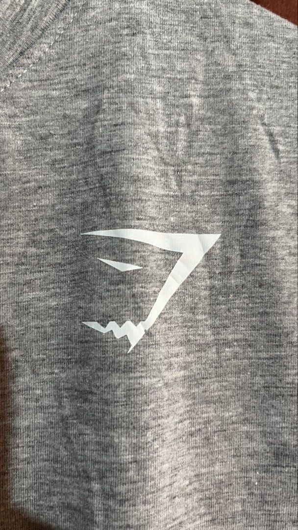 Gymshark Crest (Category: Tshirts & Polo Shirts ) located in Naga. Submitted by rexivan (Listing ID 1469581943, Image 2). Description: Gymshark Crest 👉🏽Like new Condition 👉🏽dimension: 18 Width 27 Length 👉🏽Issue: No Issue 👉🏽Color rate: 10/10 👉🏽Color: Light Grey 👉🏽Size: Small on tag 👉🏽Need Wash only 🏷️ Price + Shipping fee Location: City of Naga Cebu Limit your expectations, the items are thrifted/UKAY (unless stated as brand new), B