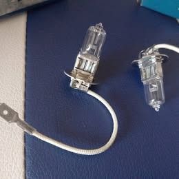 H3 Halogen Car Headlight Bulbs with Wire Lead (Category: Lighting) located in Quezon City. Submitted by susmaryosep1 (Listing ID 1469654033, Image 2). Description: - Type: H3 halogen headlight / fog light bulbs - Condition: Brand new, never installed (leftover from maintenance project) - Features: Attached wire leads with spade connectors - Design: Clear glass capsule with durable metal mounting flange - Perfect as standard replacement or trusty 