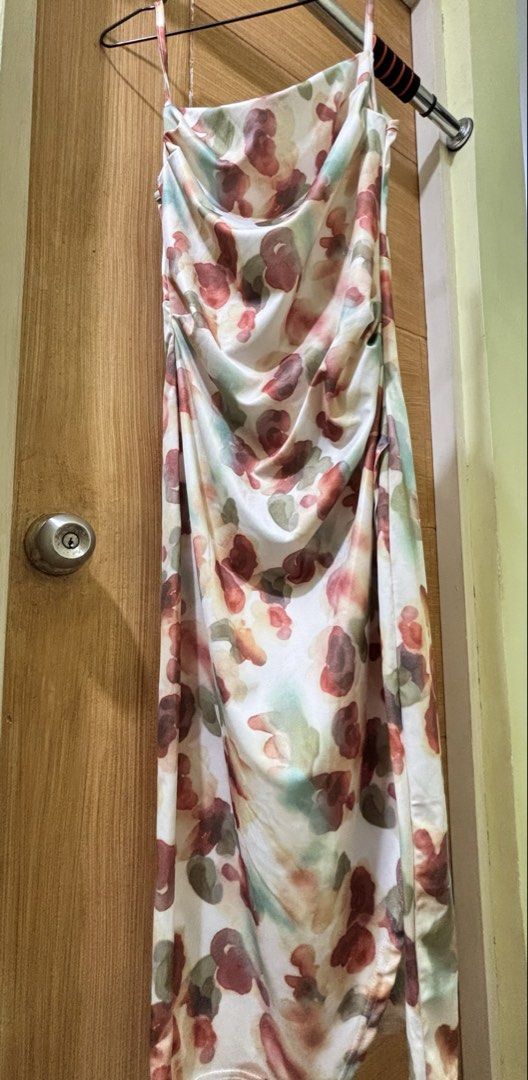 Halter floral long bodycon dress (Category: Dresses) located in Pasig City. Submitted by krystlemoc26502 (Listing ID 1469753739, Image 2). Description: beige floral slit dress - used once - size M (my size is 153 cm height, 48 kgs weight) - loc : pasig.
