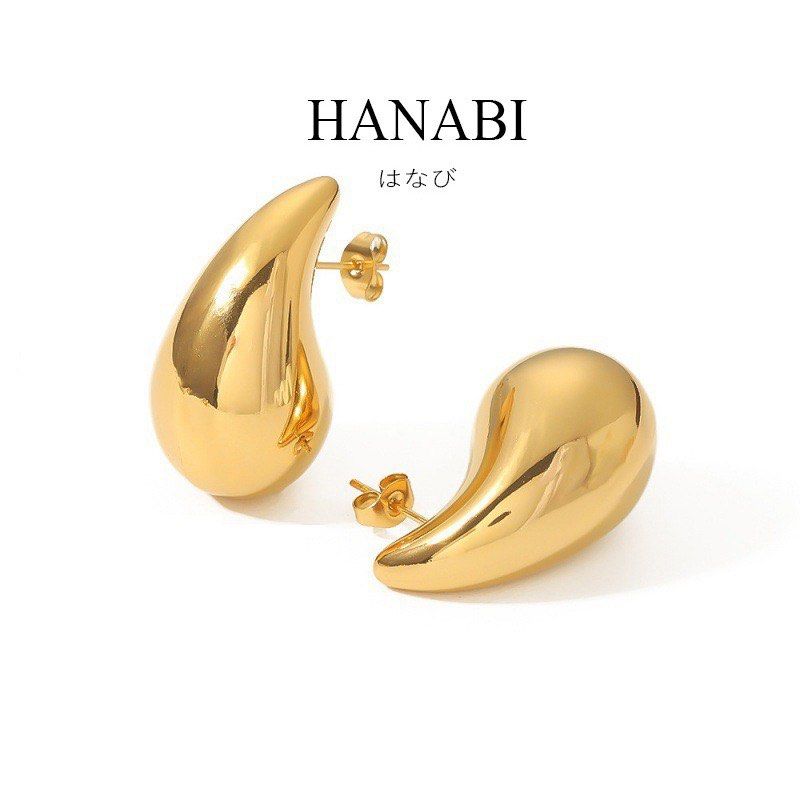 HANABI Gold Teardrop Earrings Chunky Waterdrop Studs (Category: Earrings) located in Cavite. Submitted by _schmyla (Listing ID 1469588963, Image 3). Description: - Brand: HANABI - Style: Chunky gold teardrop / waterdrop shape with a glossy polished finish - Closure: Standard post-back - Features: Lightweight, timeless minimalist design suitable for everyday wear or special occasions - Condition: Brand new in original packaging box.