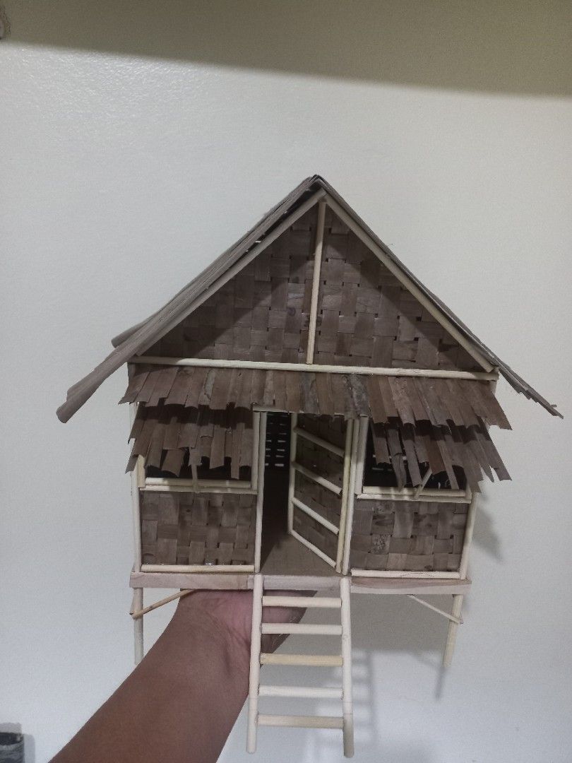 Handmade Miniature Native Bahay Kubo (Category: Vintage Collectibles) located in Calauan. Submitted by rbmanuel25 (Listing ID 1469717751, Image 2). Description: Pre-order 5 working days - Handmade miniaturebahay kubo - Traditional design with woven walls, stick frames, and layered roofing - Includes a small wooden ladder leading to the entrance - Built on detailed traditional stilts - Ideal for collections, school projects, or cultural displays .