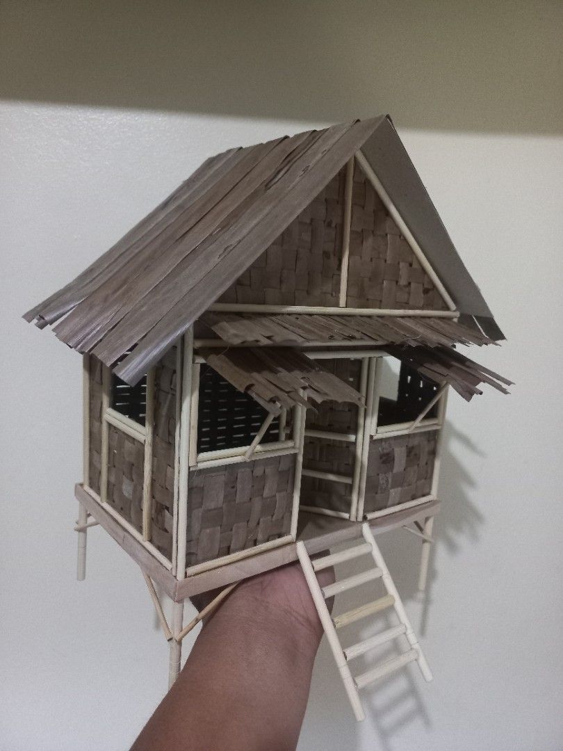Handmade Miniature Native Bahay Kubo (Category: Vintage Collectibles) located in Calauan. Submitted by rbmanuel25 (Listing ID 1469717751, Image 1). Description: Pre-order 5 working days - Handmade miniaturebahay kubo - Traditional design with woven walls, stick frames, and layered roofing - Includes a small wooden ladder leading to the entrance - Built on detailed traditional stilts - Ideal for collections, school projects, or cultural displays .