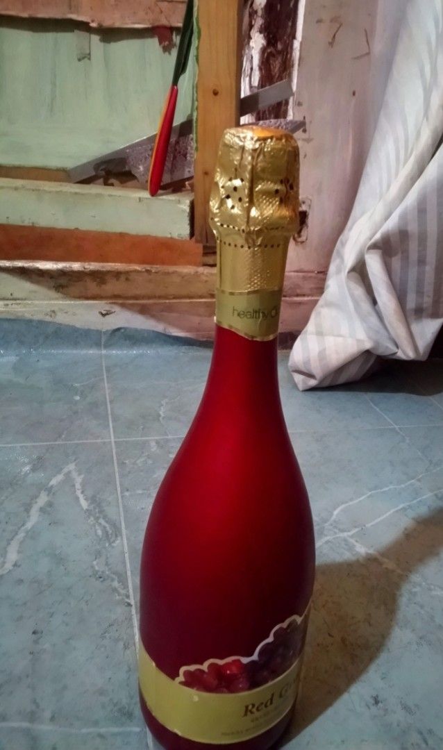 Healthy Options Sparkling Red Grape Juice 750ml (Category: Beverages) located in Caloocan City. Submitted by grandcloud.a0efa7 (Listing ID 1469758709, Image 1). Description: - Item: Healthy Options Sparkling Red Grape Juice - Size: 750ml bottle - Condition: Brand new, unopened, and still sealed in bubble wrap - Features: Non-alcoholic, festive red matte bottle with gold foil top - Best for: Holidays, celebrations, special dinners, or gifting.