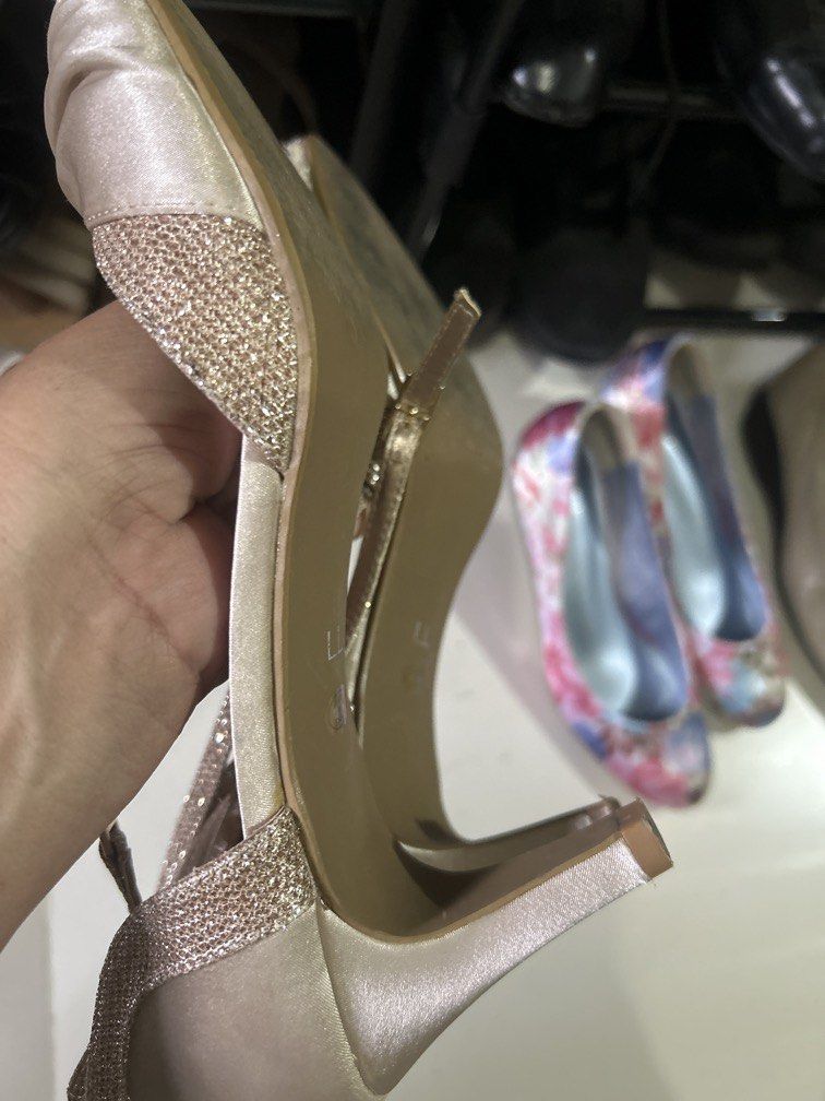 Heels champagne gold satin size 9 (Category: Heels) located in Cavite. Submitted by cecitrifthshop (Listing ID 1469631337, Image 3). Description: image shows a pair of champagne-gold satin and glitter-accented ankle-strap party pumps, size 8 to 9 .