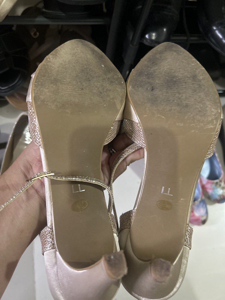 Heels champagne gold satin size 9 (Category: Heels) located in Cavite. Submitted by cecitrifthshop (Listing ID 1469631337, Image 2). Description: image shows a pair of champagne-gold satin and glitter-accented ankle-strap party pumps, size 8 to 9 .
