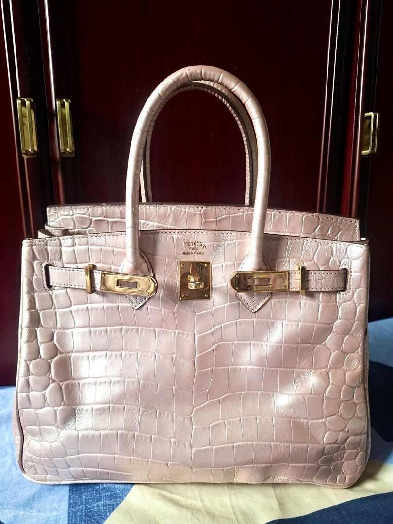 Hermes Birkin 25 Crocodile Embossed (Category: Tote Bags) located in General Santos City (Dadiangas). Submitted by mj_luxuries_bags_and_stuff (Listing ID 1469602930, Image 1). Description: Rare to find‼️25cm From Japan Surplus Shiny light pink crocodile embossed leather Riri zipper With light signs of usage No major issues .